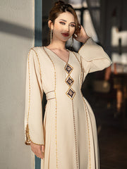 5206Beige Arabic Abaya Dress | V-Neck Gold Beaded Gown with Geometric Embroidery & Bell Sleeves