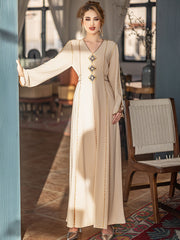 5206Beige Arabic Abaya Dress | V-Neck Gold Beaded Gown with Geometric Embroidery & Bell Sleeves